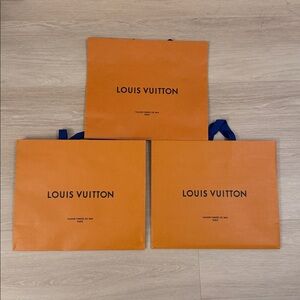 Louis Vuitton Bold Orange Bags with Blue Handles
